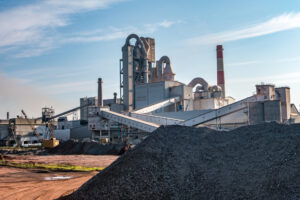 industrial-grey-landscape-environmental-pollution-waste-cement-factory-big-pipes-industry-enterprise-plant-mountains-sand-rubble