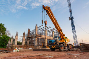 mobile-crane-tower-crane-pouring-concrete-construction-site